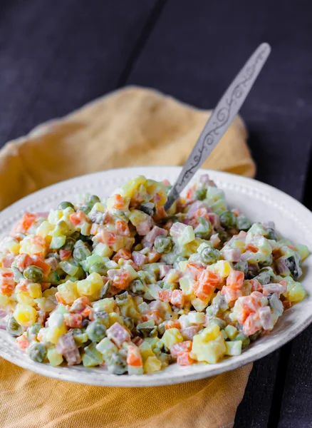 Olivier salad a festive table, new year — Stock Photo, Image