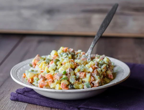 Olivier salad a festive table, new year — Stock Photo, Image