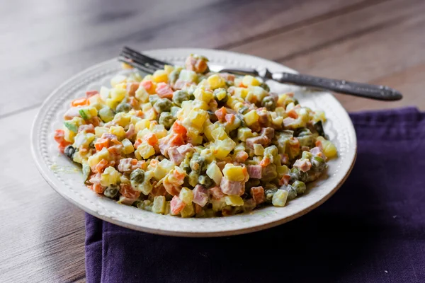 Olivier salad a festive table, new year — Stock Photo, Image