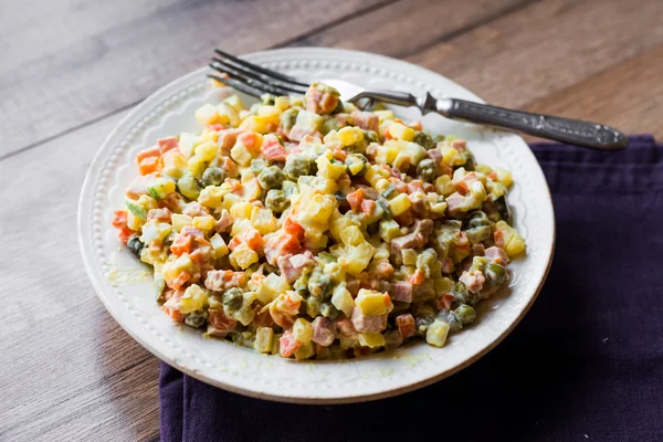 Olivier salad a festive table, new year — Stock Photo, Image