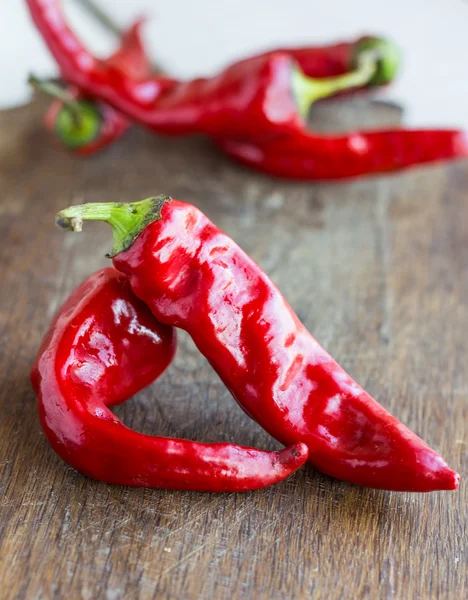 Raw red chili pepper on a cutting board, spices — Stock Photo, Image
