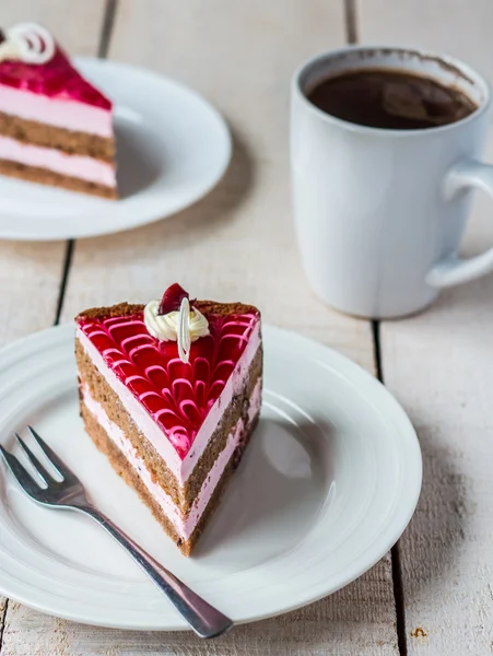 Piece of cake with sponge cake, cream berry mousse and jelly — Stock Photo, Image