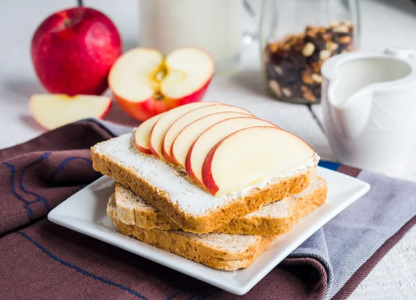 toast with cheese curd, honey and red apple, snack