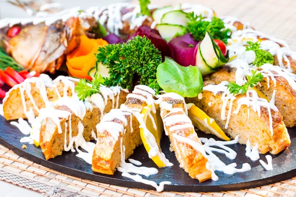 Gefilte fish, pike with vegetables and herbs, restaurant — Stock Image Gefilte fish, pike with vegetables and herbs, restaurant Royalty Free Stock Photos