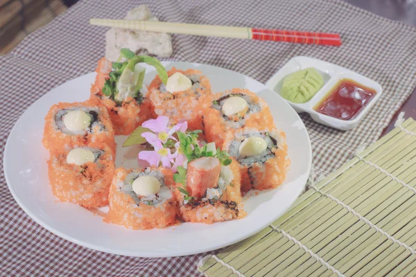 The make sushi in home and take photo in studio