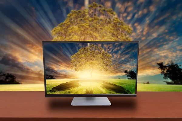 The computer on table and background nature — Stock Photo, Image