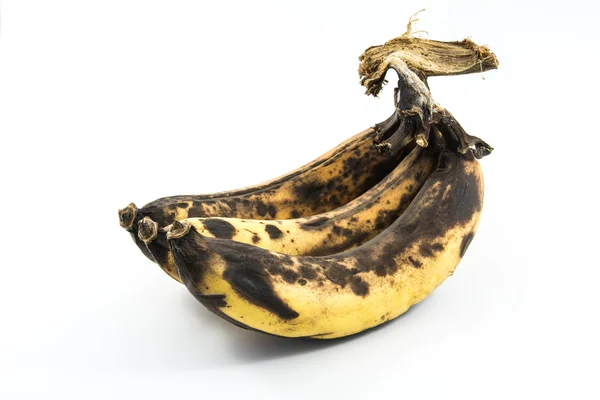 Μπανάνες αποσύνθεση σε λευκό Royalty Free Εικόνες Αρχείου