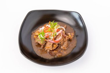 Ekşi soslu biftek güveci.