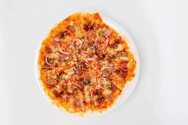 thin-crusted pizza with hot sauce