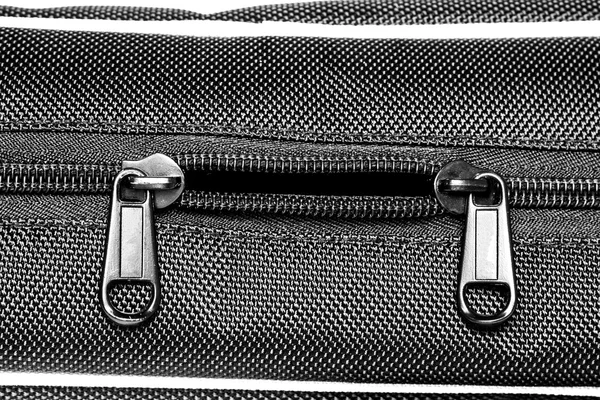 Metal zipper on black synthetic fabric — Stock Photo, Image