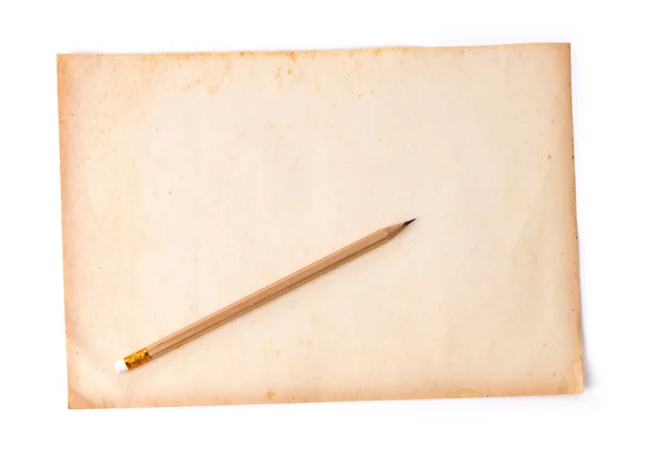 Wooden pencil on the old dirt paper Stock Picture