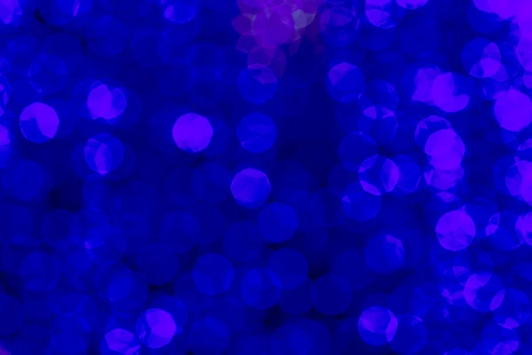 Oskärpa djupblå bokeh belysning i natt sköt som bakgrund — Stockfoto