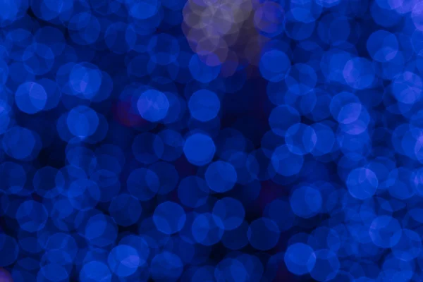 Blur deep blue bokeh lighting in night shot as background — Stock Photo, Image