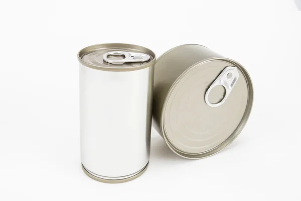 Lata de lata de ferro dourado luz no fundo branco — Fotografia de Stock