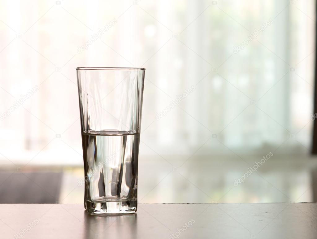 Closeup Glass of water on table in the living room — Stock Photo