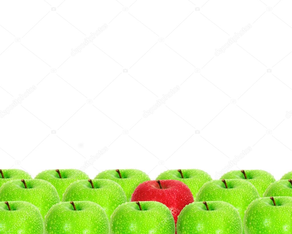red apple place on white background among green apple with water droplet as frame border , unique or different concept