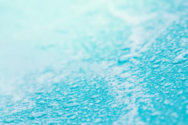 Legközelebb eső víz csepp kék szivacs felületén fel absztrakt bac — Stock Fotó