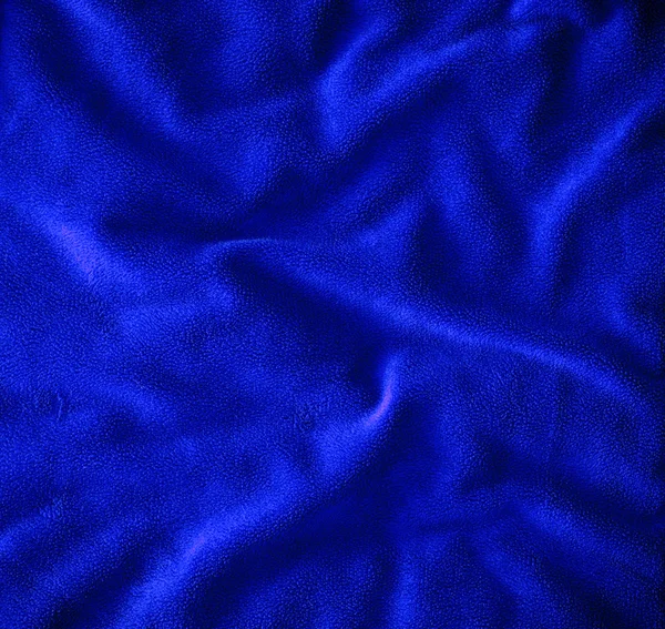 Chiudere su tessuto di pelliccia blu stropicciato texture — Foto Stock