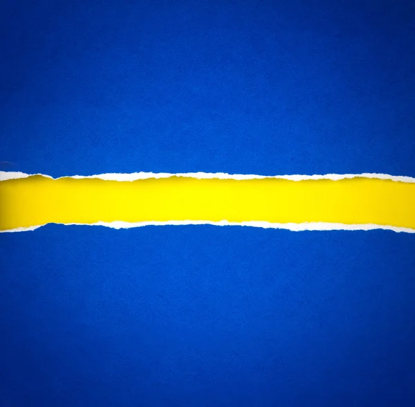 Torn blue Paper and space for text with yellow paper background — Stock Photo, Image