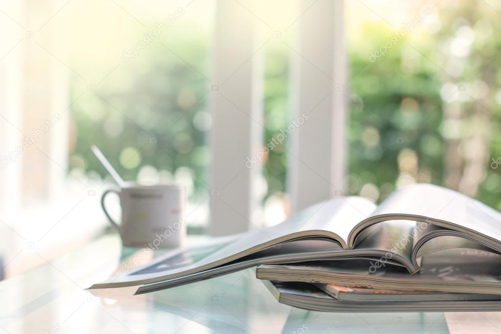 selective focus of stacking magazine place on table in living ro