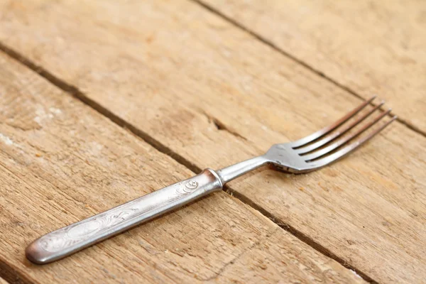 Sfondo una vecchia forchetta di metallo — Foto Stock