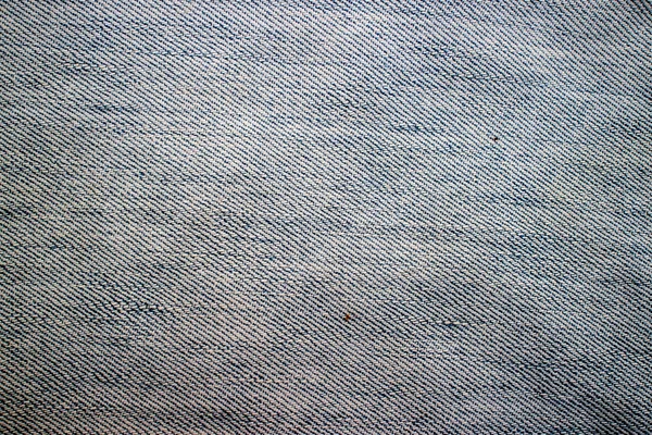 Текстурированный фон джинсовой ткани — стоковое фото