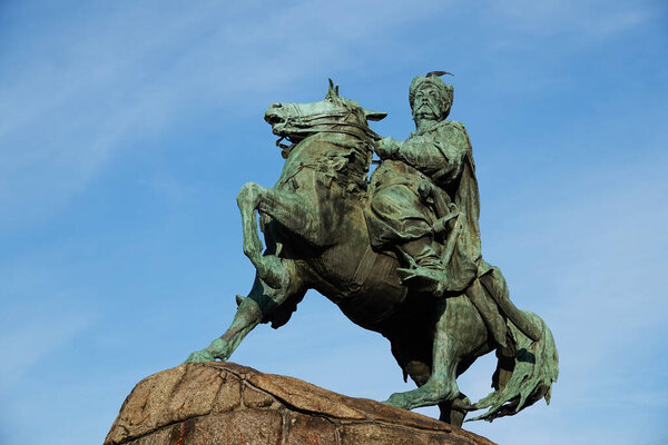 Kiev, Ukraine December 9, 2019: Monument to Hetman Bogdan Khmelnytsky on a horse with a mace in Kiev