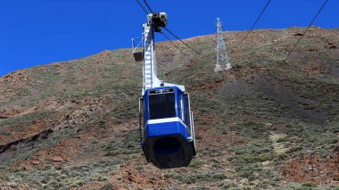 Canary Islands, Spain March 19, 2013: cableway with a cabin high above the ground among canyons