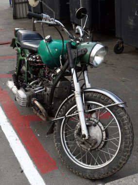Kiev, Ukraine October 28, 2020: Old vintage motorcycle of the times of the USSR in green