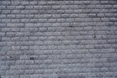 Granit bloklardan yapılmış duvar çiti.