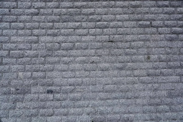 Granit bloklardan yapılmış duvar çiti.