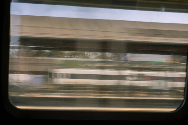 ABSTRACT IMAGE FROM WINDOW IN A TRAIN. DENMARK, COPENHAGUE, MARCH 2019 — Stock Photo, Image