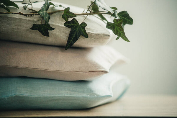 three pillows on a white background