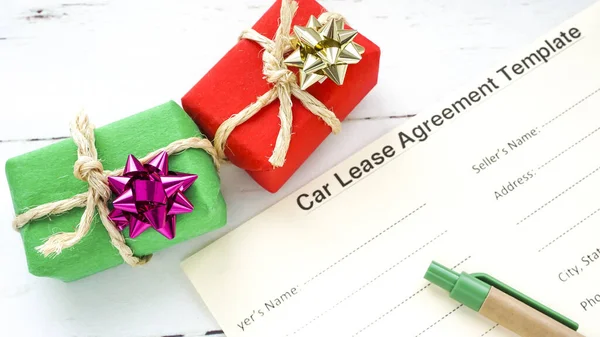 Global Leasing Day.car lease agreement and pen on a beautiful background