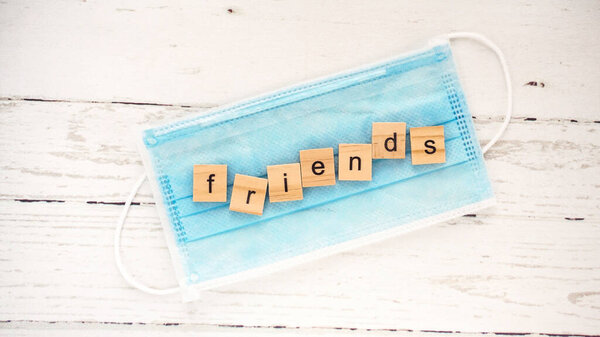 friends  day.words from wooden cubes with letters photo