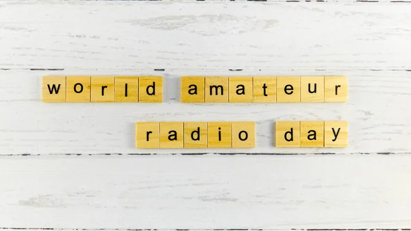 World Amateur Radio Day.words from wooden cubes with letters