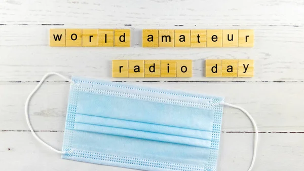 World Amateur Radio Day.words from wooden cubes with letters