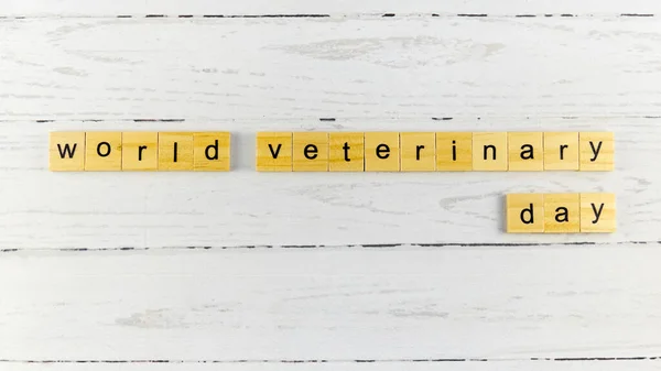 World Veterinary Day.words from wooden cubes with letters