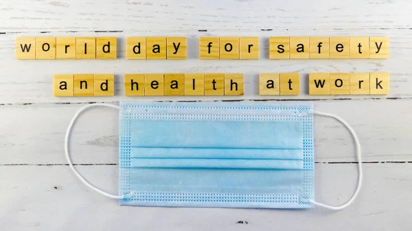 World Day for Safety and Health at Work.words from wooden cubes with letters
