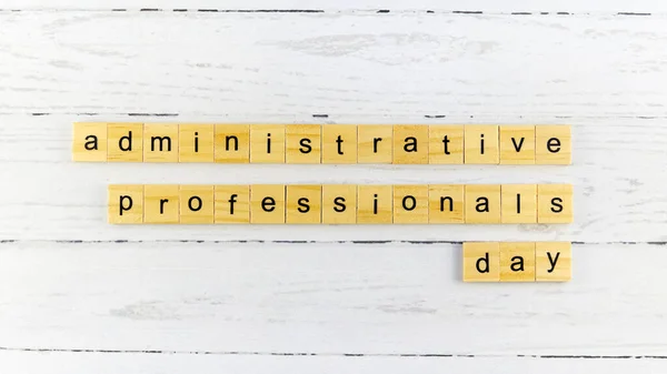 Administrative Professionals Day.words from wooden cubes with letters photo