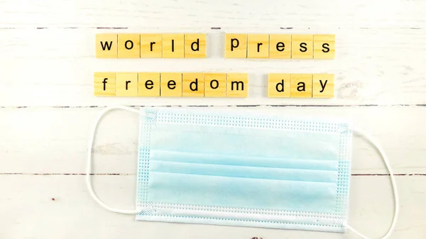 World Press Freedom Day.words from wooden cubes with letters photo