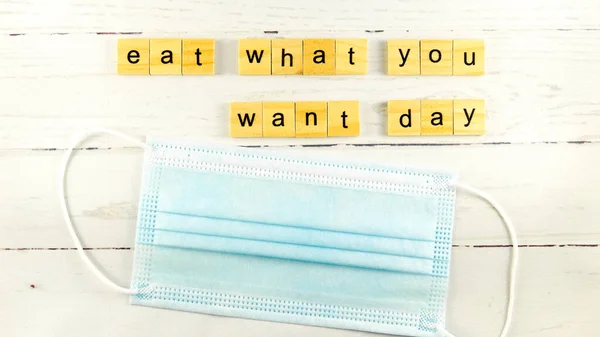 Eat What You Want Day.words from wooden cubes with letters photo