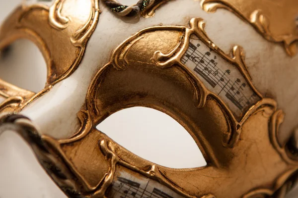 Golden carnival mask close up Stock Picture