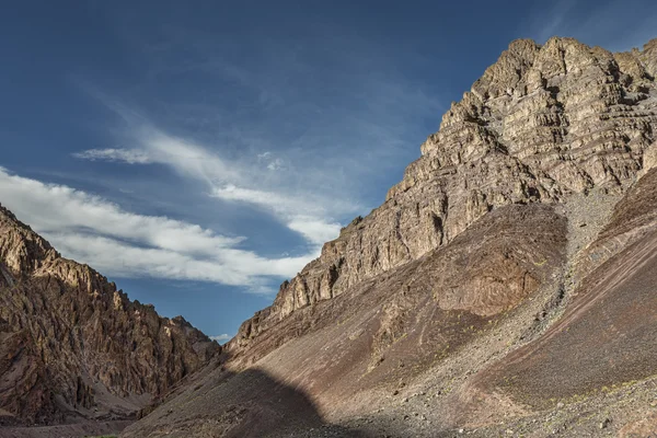 Giant jagged mountains with shadow — Stock Photo, Image