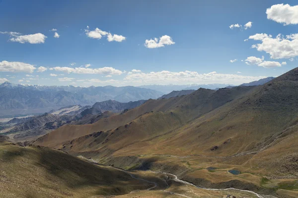 Aerial view to desert mountains with river and lake — Stock Photo, Image