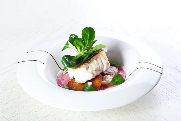 Baked fish with potatoes — Stock Image Baked fish with potatoes Stock Image