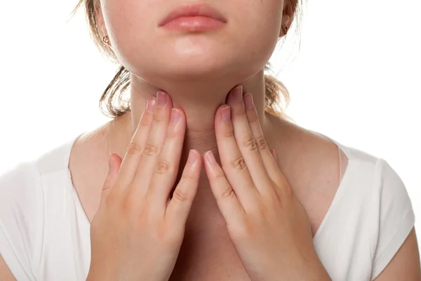 Girl touching her throat ache or pain in throat emotion Stock Picture