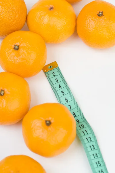 Mandarins and the meter line — Stock Photo, Image
