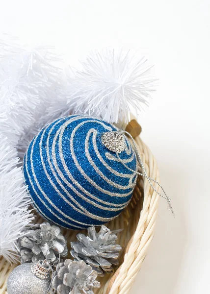 Little New year tree toys in the box on the wood backing — Stock Photo, Image