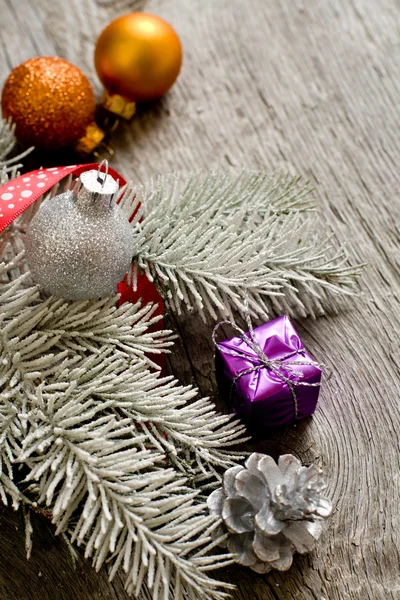 Little New year tree toys on the wood backing — Stock Photo, Image